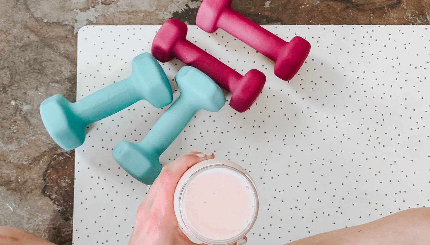 Dumbbells' and a glass of smoothie